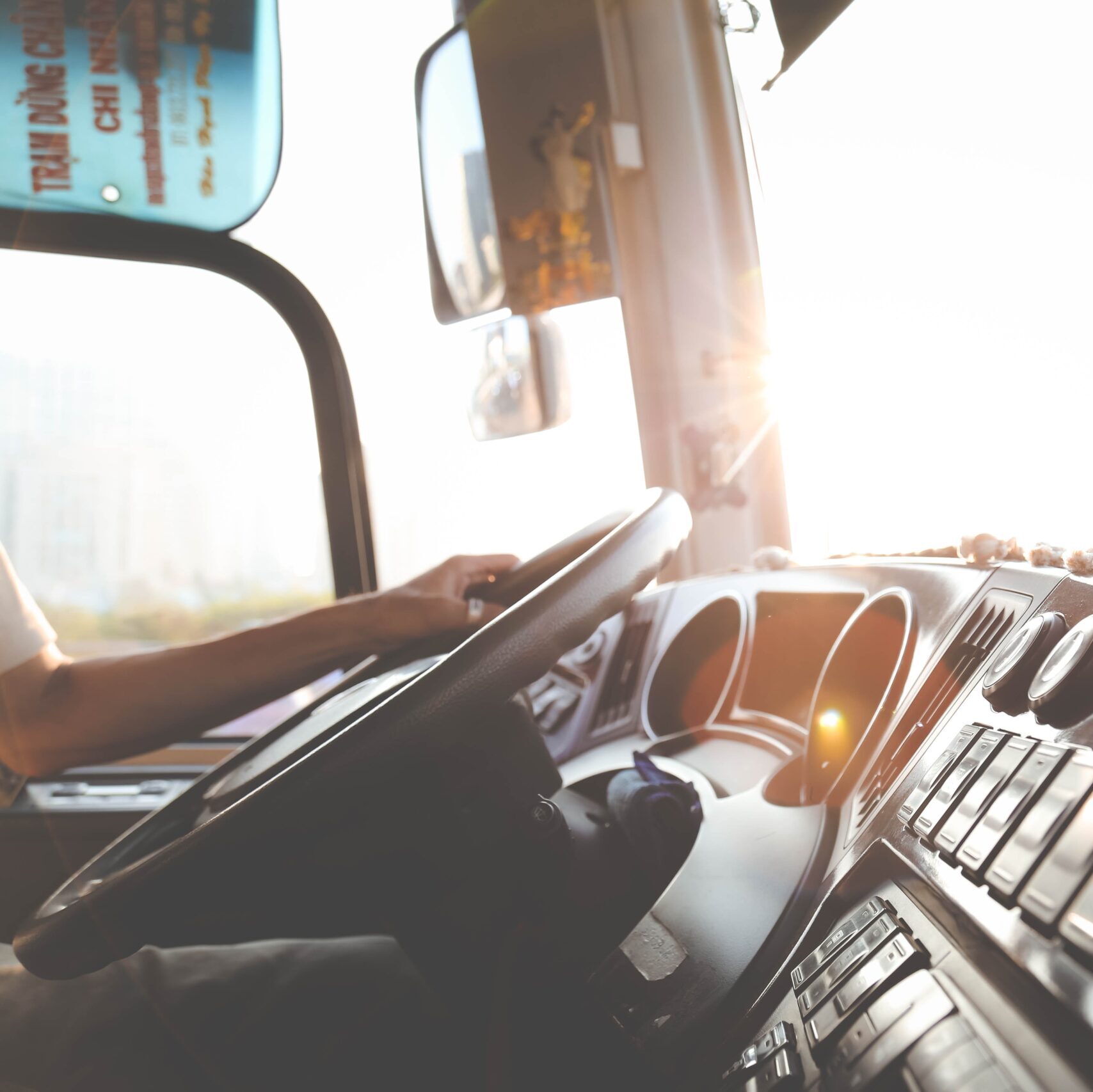Truck driver Dashboard of truck with drivers hands